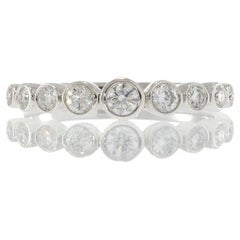 18KT White Gold Graduated Bezel Set Diamond Band