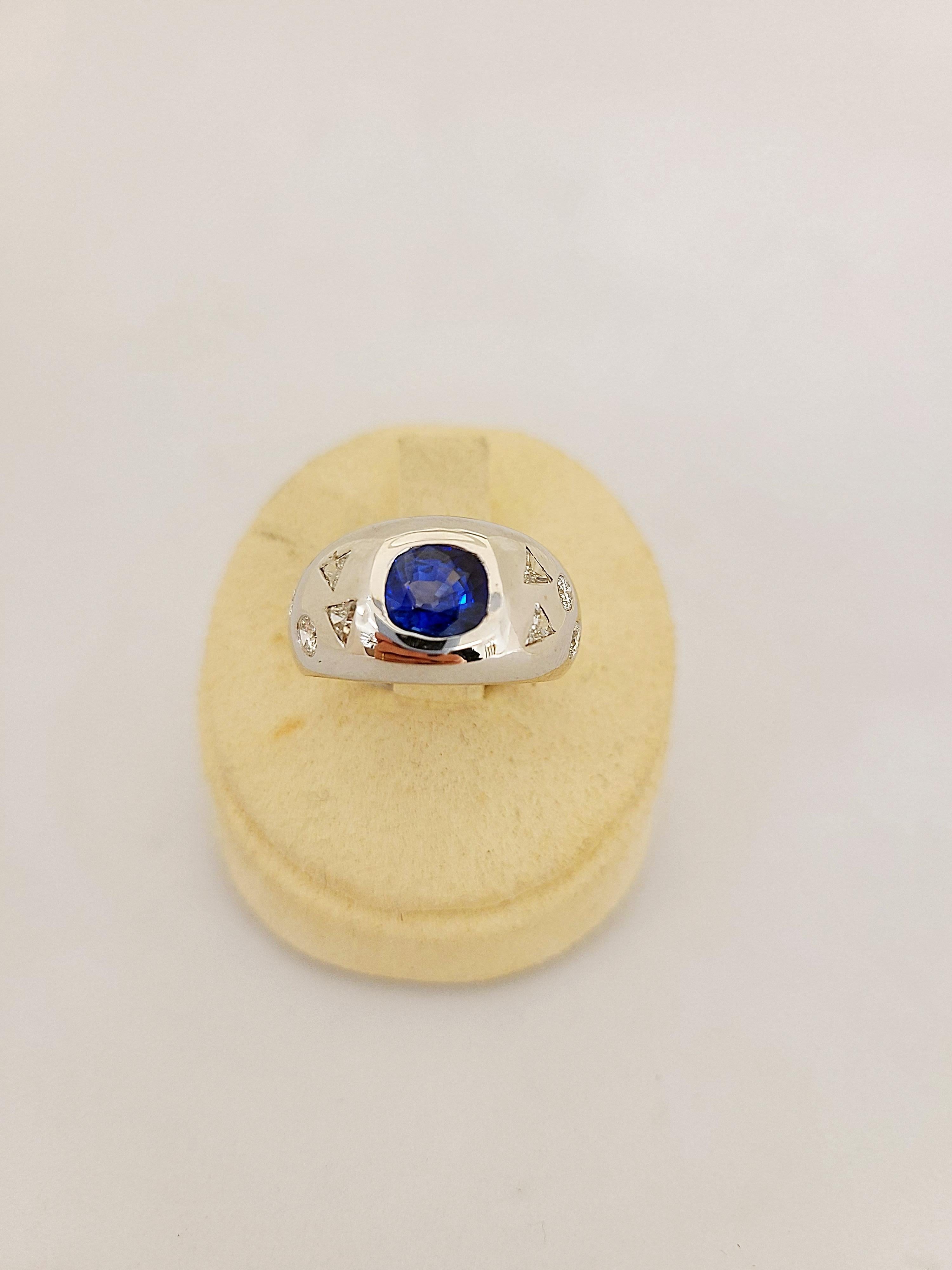 Contemporary 18 Karat WG Gypsy Ring with 1.82 Carat Sapphire and Fancy Shaped Diamonds For Sale
