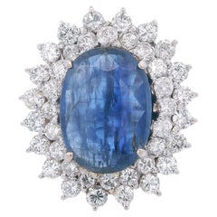 Anello Halo in oro bianco 18 carati con zaffiri e diamanti per un totale di 9,58 carati