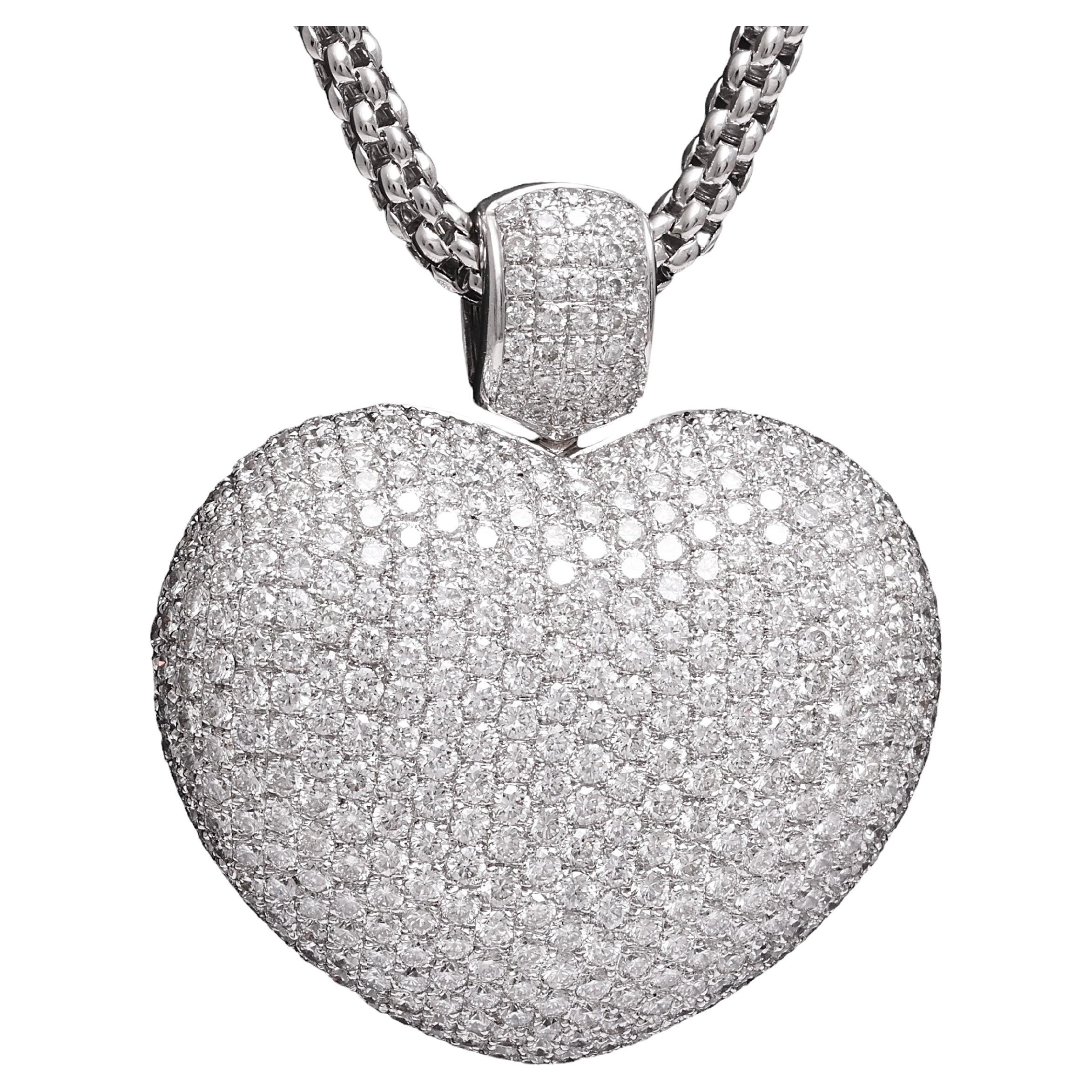 Gorgeous 18kt White Gold Heart Pendant With 17 ct. Top Quality Diamonds With 18kt White Gold Necklace

Diamonds: Brilliant cut diamonds, together 17 ct.

Material: 18 kt. White gold

Measurements: Necklace: length 42 cm long
Pendant: 46.5 mm x 51 mm