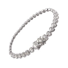18KT White Gold Heart Shape Diamond Tennis Bracelet – 4.84 Carat