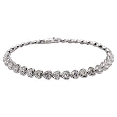 18KT White Gold Heart Shape Diamond Tennis Bracelet – 4.84 Carat