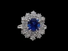 18kt White Gold Intense Blue NH Sapphire Ring, Baguette & Brilliant Cut Diamonds