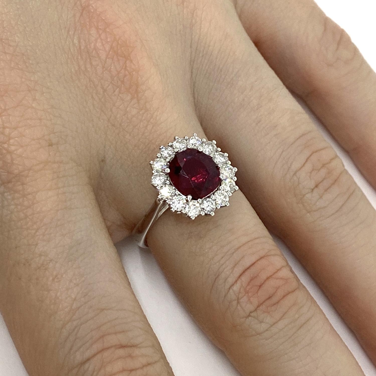 Ring made of 18kt white gold with natural brilliant-cut ruby for ct.2.11 and brilliant-cut white natural diamond surround for ct.0.74
-------------------------------------------------

Important Note : In order to speed up the publishing process of