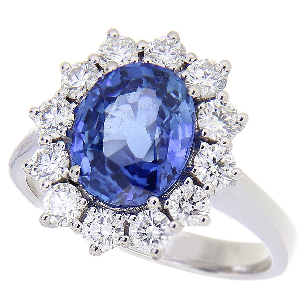 18kt White Gold Kate Ring 2.92 Ct Blue Oval Sapphire 0.87 Ct White Diamonds For Sale