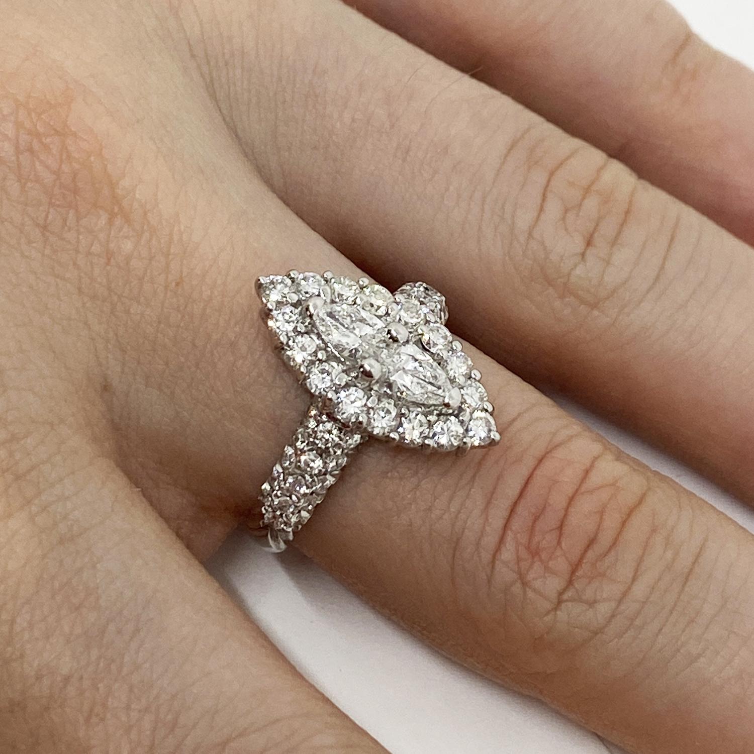 Ring made of 18kt white gold with marquise-cut natural diamonds for ct.0.35 and pavé brilliant-cut natural white diamonds for ct.0.78
-------------------------------------------------

Important Note : In order to speed up the publishing process of