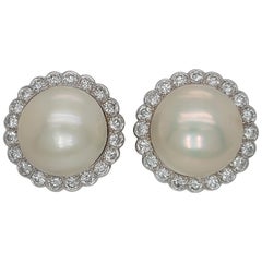 18 Karat White Gold Mabe Pearl Clip-On Earrings Surrounded with Diamonds