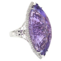 Anello Cocktail con Ametista Marquise in oro bianco 18KT e Diamante aureolato