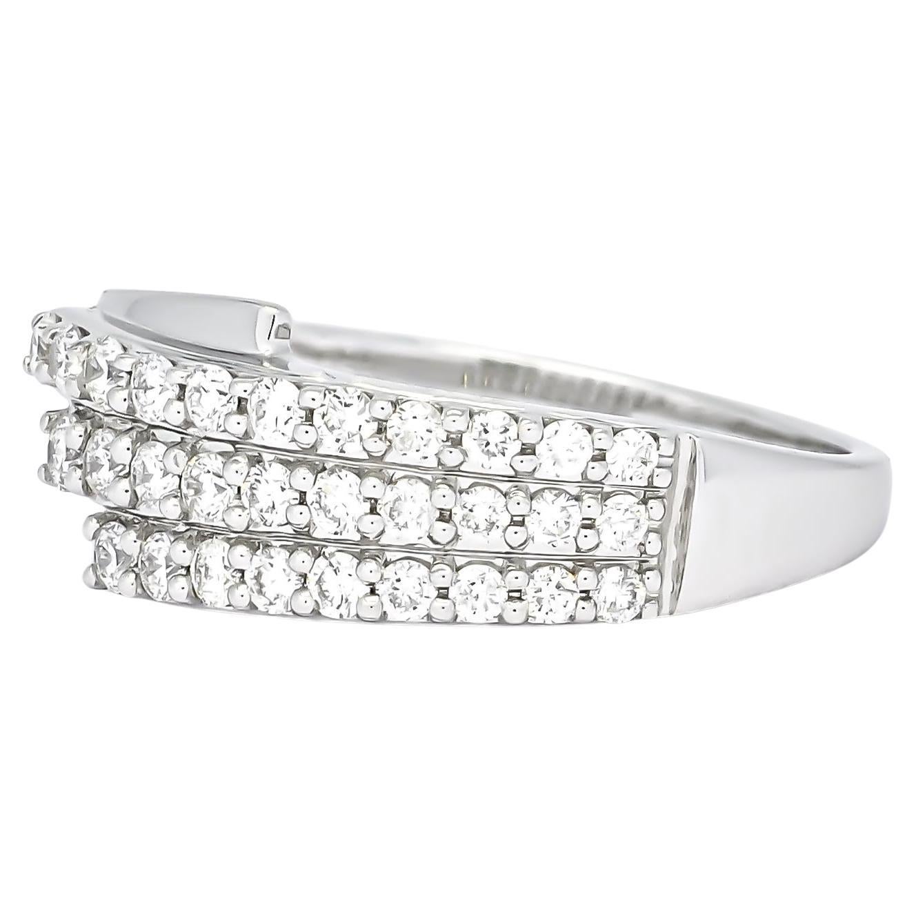 Immerse yourself in the captivating allure of this stunning 18K white gold multi-row diamond ring, showcasing a lovely pave setting in an accented designer style that radiates sparkle and sophistication. Totaling 0.55 carats, the diamonds in this
