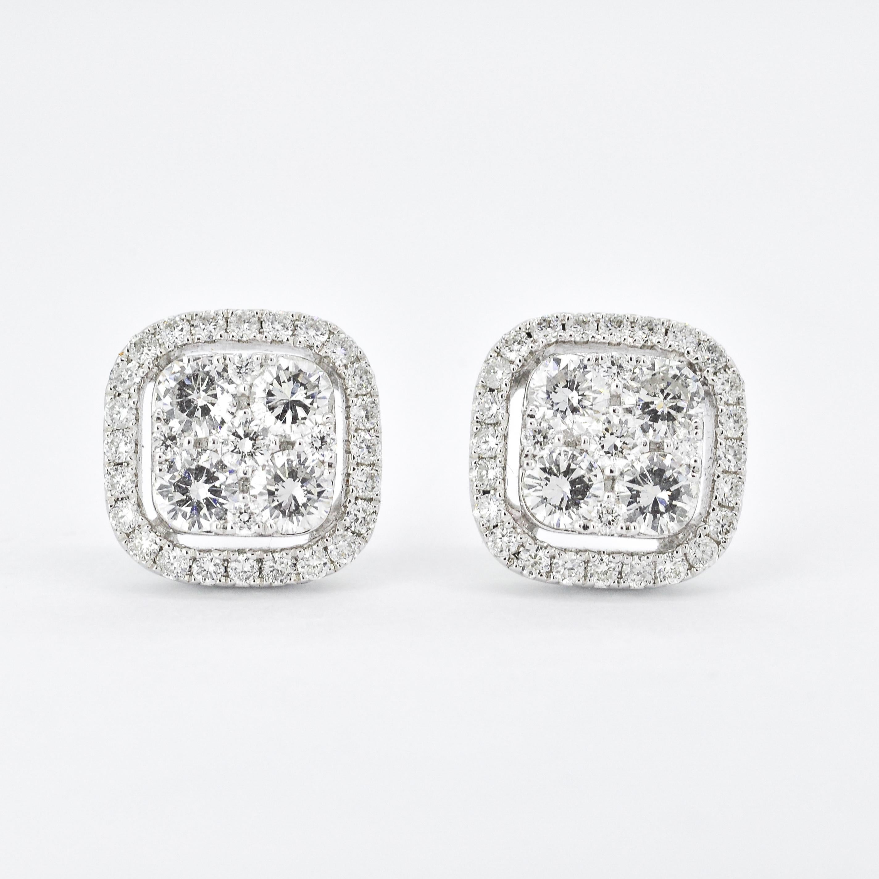 These stunning stud earrings are designed to captivate with their exquisite beauty. They feature round-cut diamonds expertly arranged in sophisticated cushion square clusters. The clusters create a visually striking pattern that adds a touch of