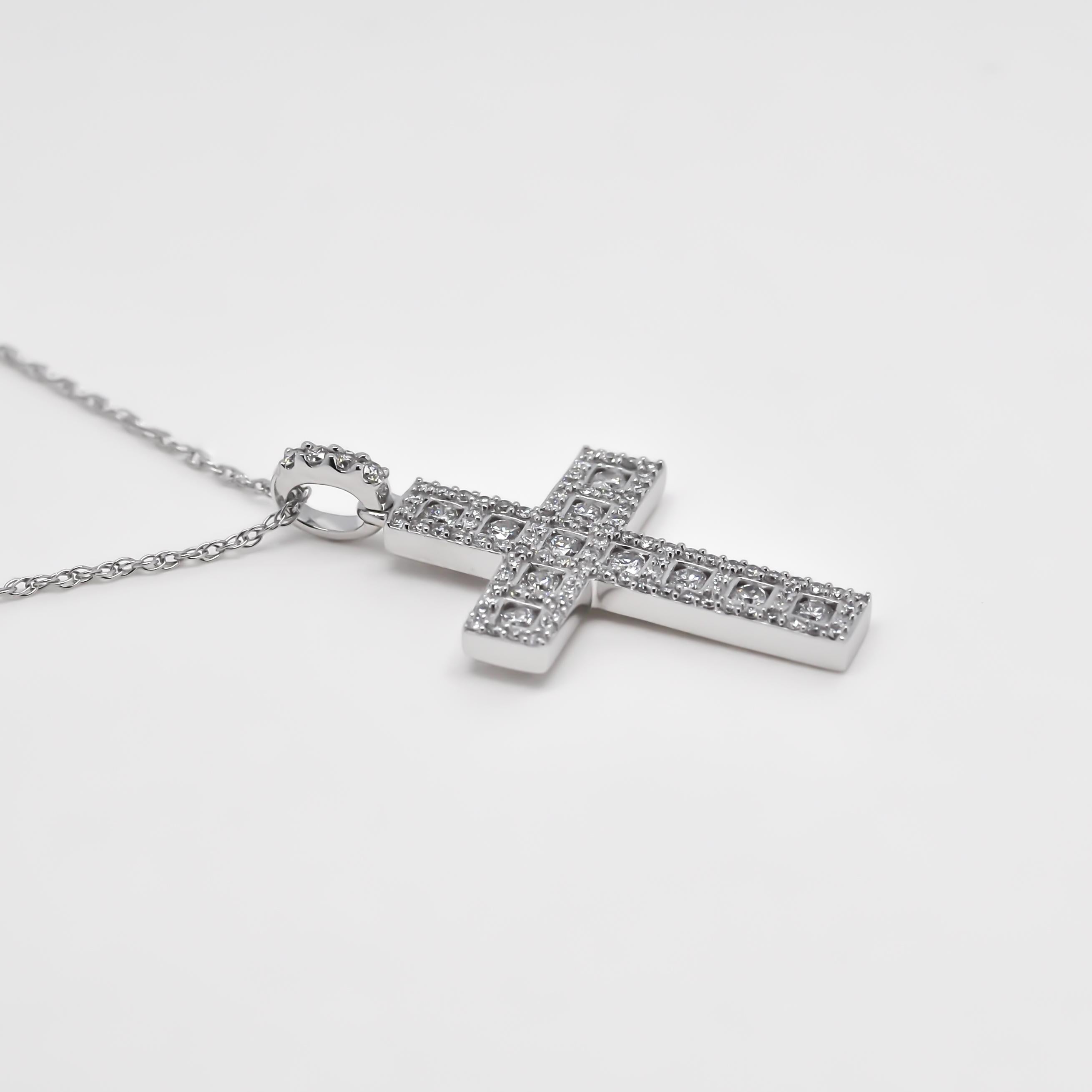 This exquisite piece of jewelry blends vintage charm with contemporary elegance, creating a truly captivating pendant necklace.

Crafted with utmost precision and artistry, this pendant features a vintage-inspired cross crucifix design, exuding