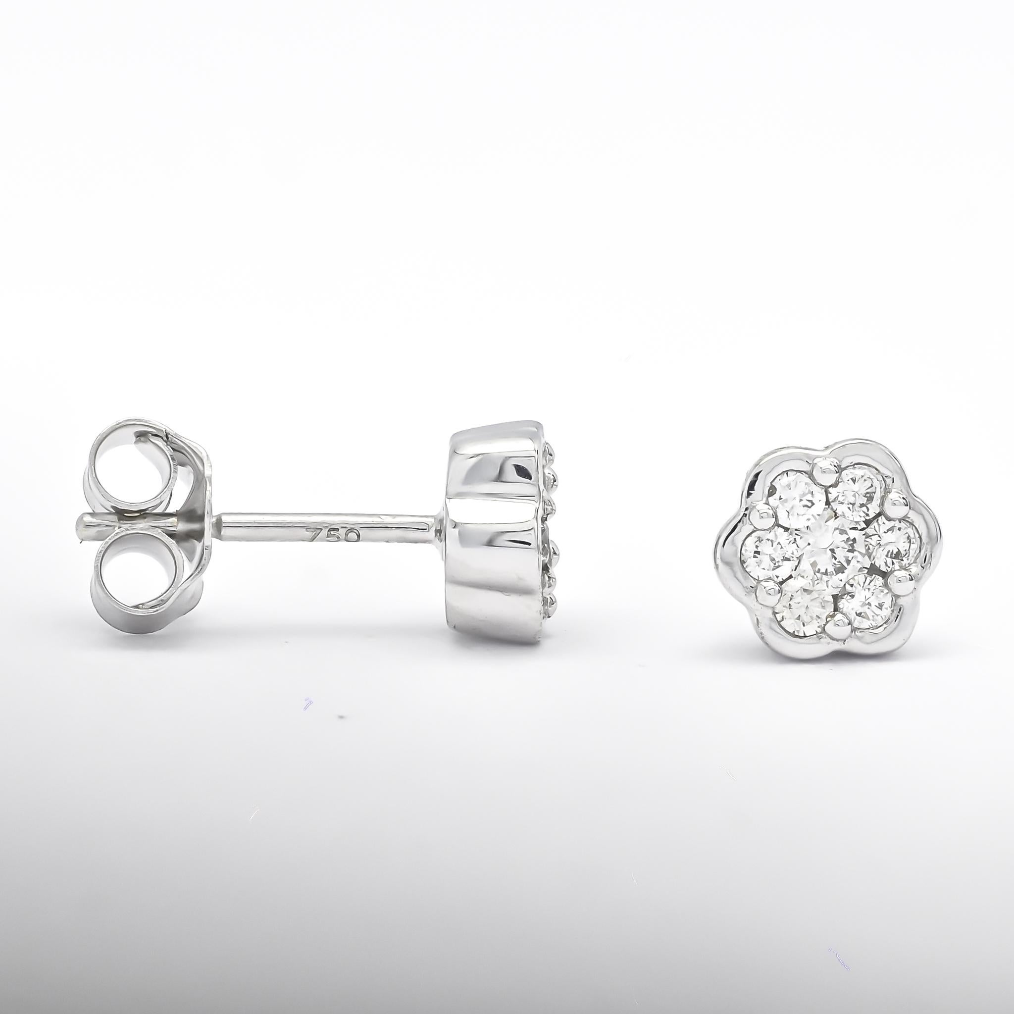 These magnificent and dazzling 18KT White Gold Natural Diamonds Flower Bezel set Cluster Stud Earrings are made with incredible craftsmanship and top quality. These earrings are made from 100% natural diamonds and are highly polished for a better