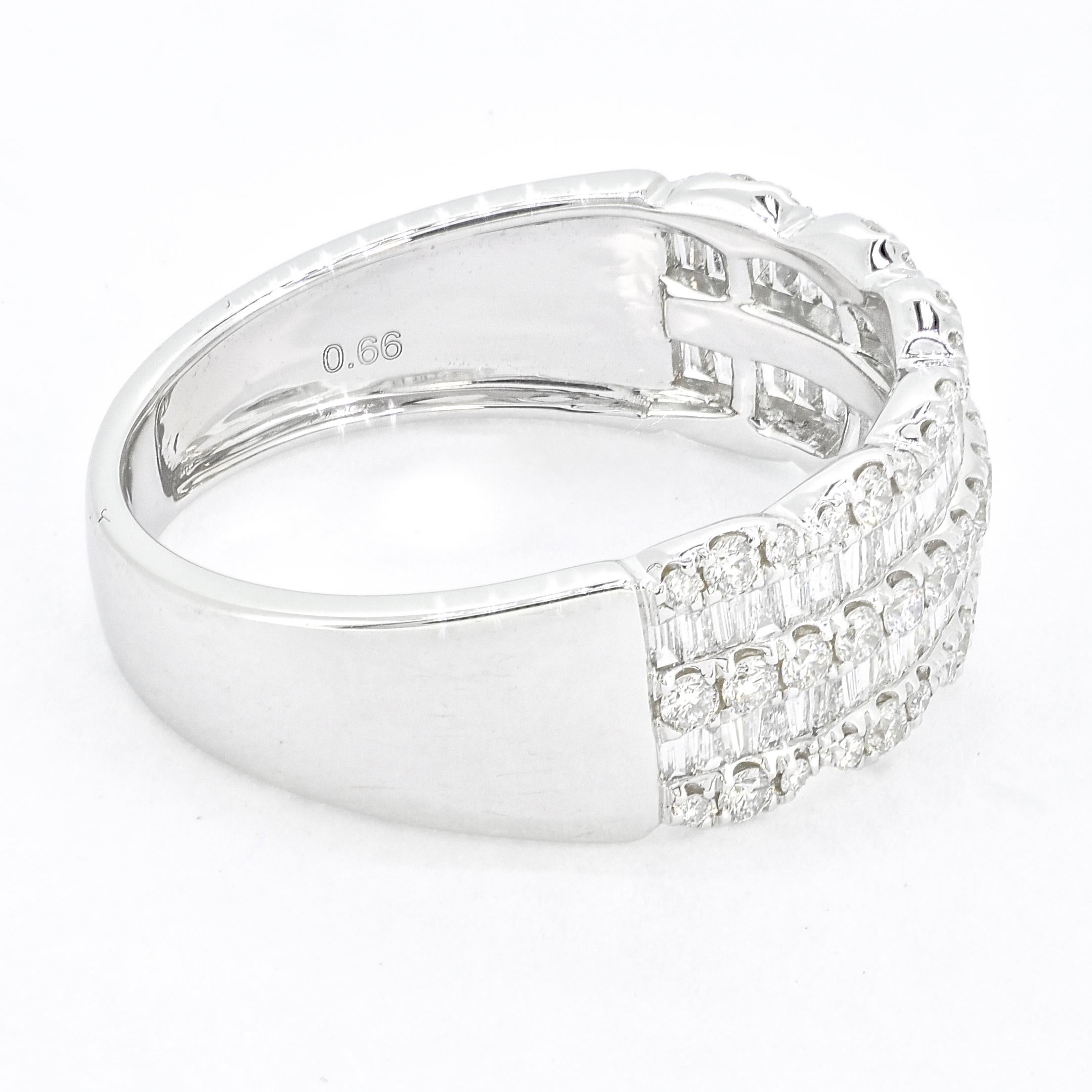 If you're looking for a beautiful and versatile diamond band that can be worn alone or stacked with other rings, consider a baguette and round diamond channel set 18 kt gold band. This exquisite piece features a row of alternating baguette and round