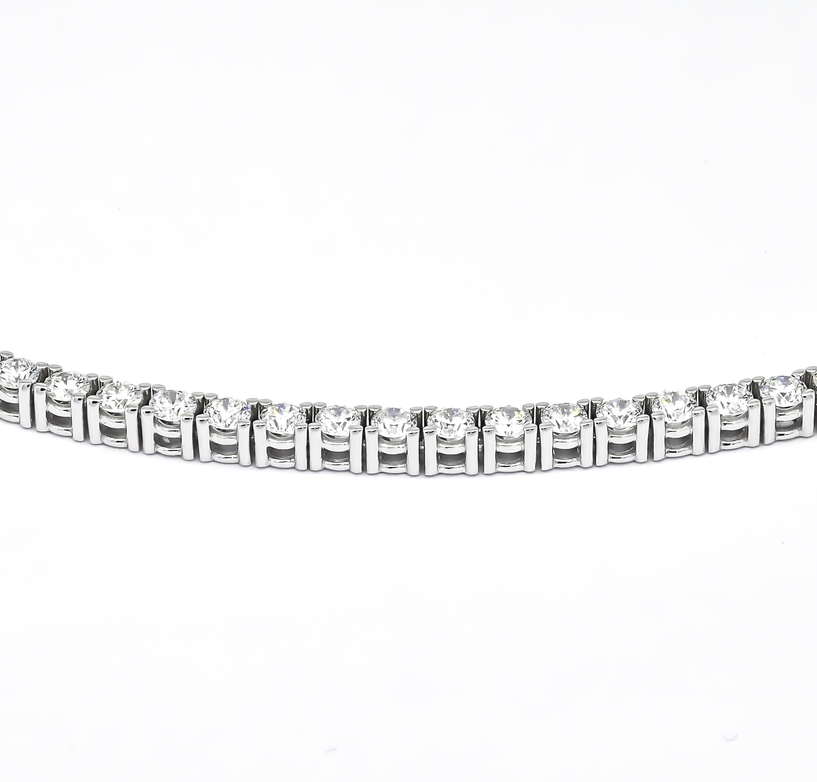 Introducing the ultimate symbol of timeless elegance: our 18KT White Gold Natural Round Diamond All Round Collar Statement Necklace. This luxurious piece is designed to commemorate your love and devotion on special anniversaries.

Featuring an