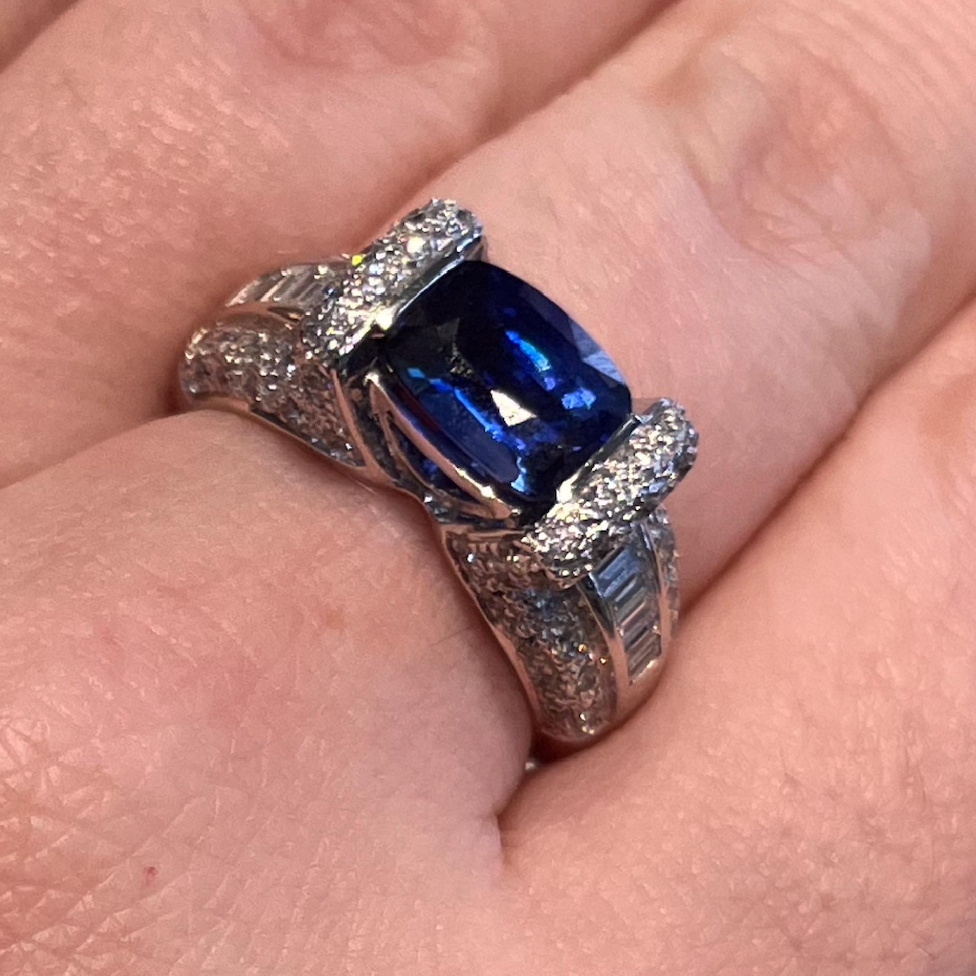 18kt White Gold No Heat Sapphire 2.86cts & Diamond Ring. This Ring Contains One (1) Elongated Cushion Cut Sapphire Weighing Approximately 2.86cts, This Stone Measures 9.3mm x 6.9mm x 4.8mm. The Sapphire is Not Heated or Color Treated. The Sapphire