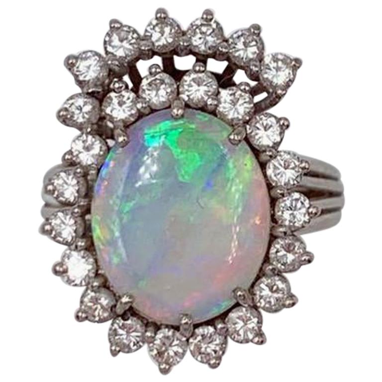 Retro 18 Karat White Gold Opal and Cluster Diamond Ring For Sale