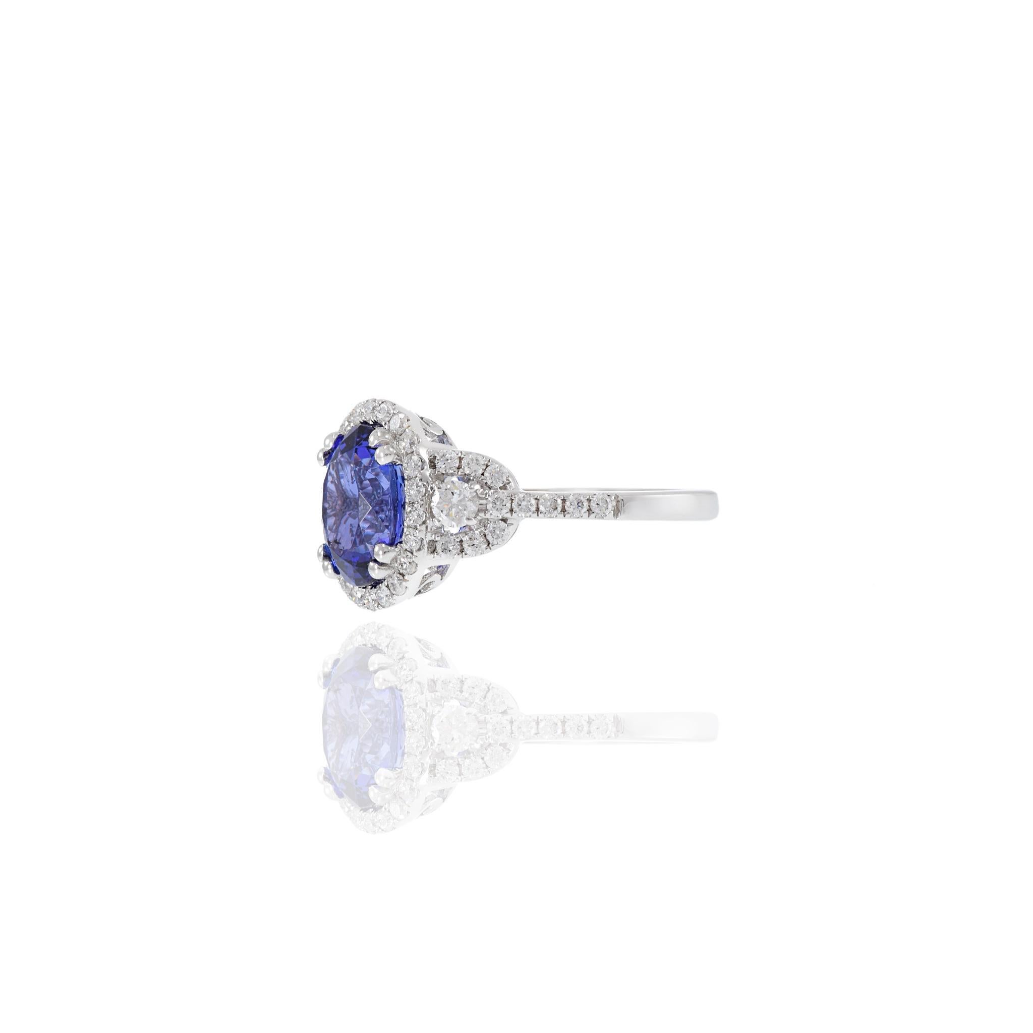 Women's 18KT White Gold Oval Cut Tanzanite And Diamond Ring For Sale