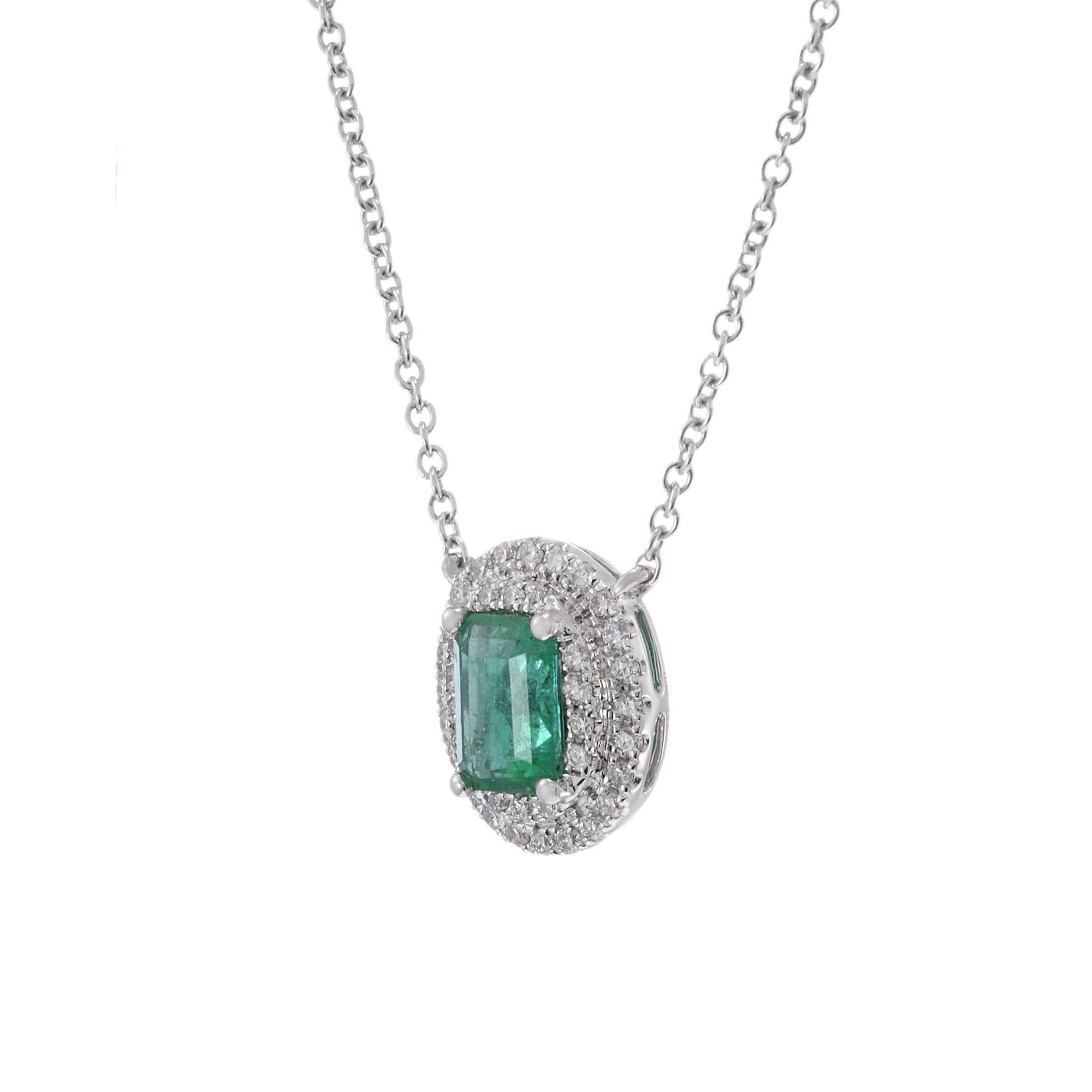 Modern 18KT White Gold Oval Emerald and Diamond Pendant with Chain For Sale
