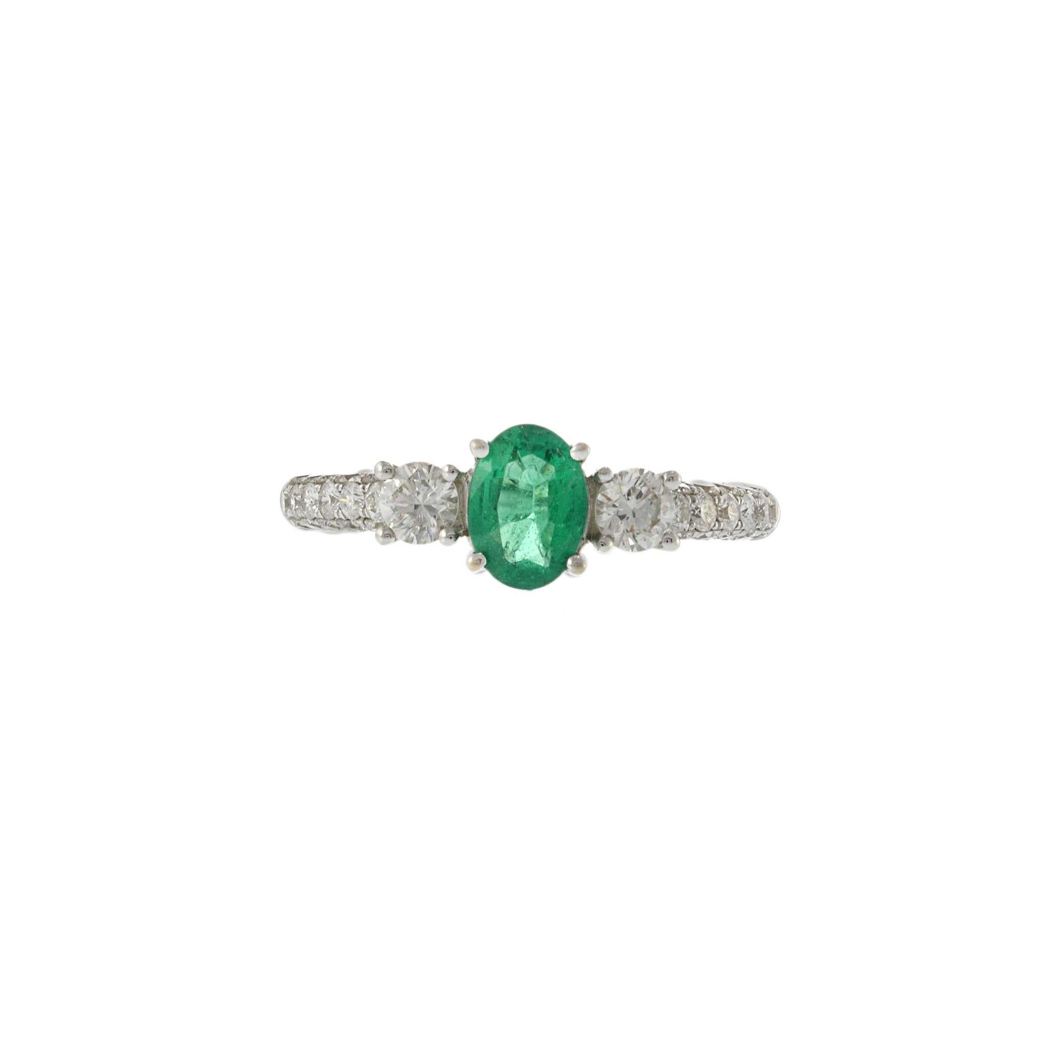 Modern 18KT White Gold Oval Emerald and Diamond Ring For Sale
