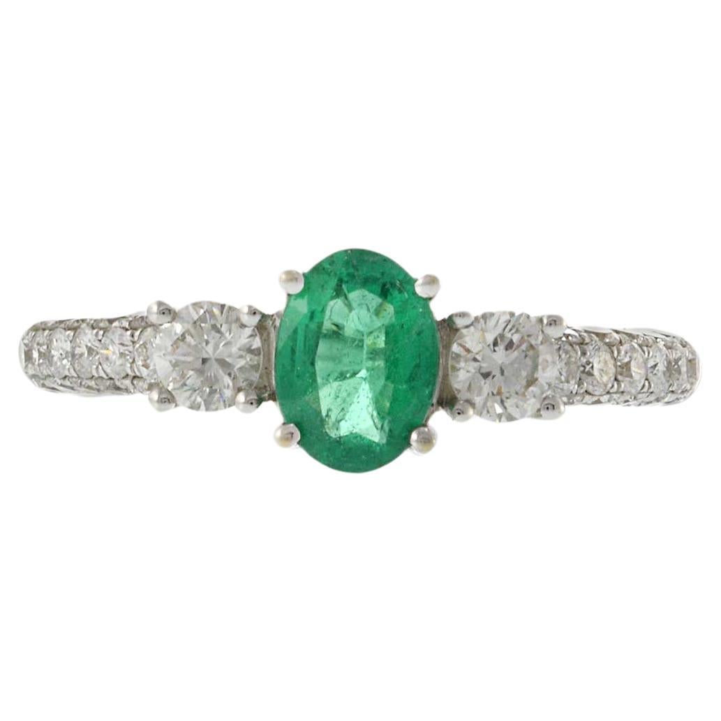 18KT White Gold Oval Emerald and Diamond Ring