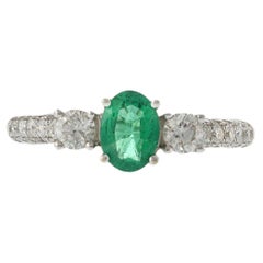 18KT White Gold Oval Emerald and Diamond Ring