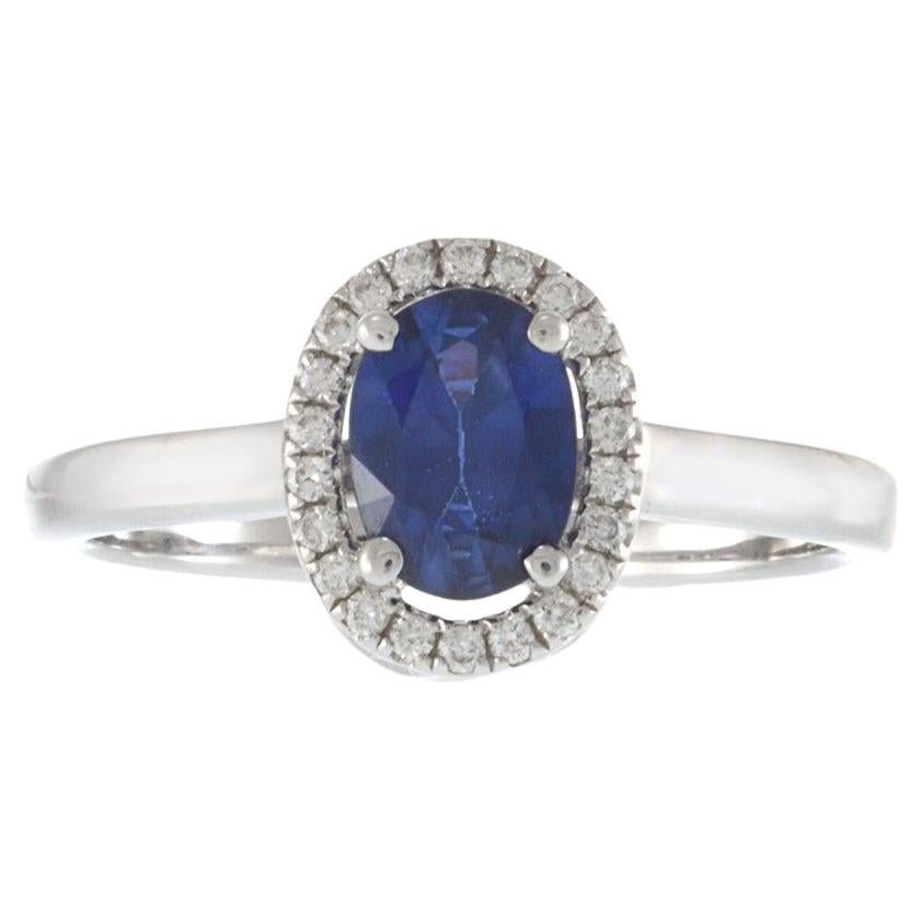 18KT White Gold Oval Sapphire and Diamond Halo Ring
