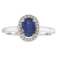18KT White Gold Oval Sapphire and Diamond Halo Ring