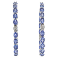 Boucles d'oreilles en or blanc 18KT avec Tanzanite ovale et diamant