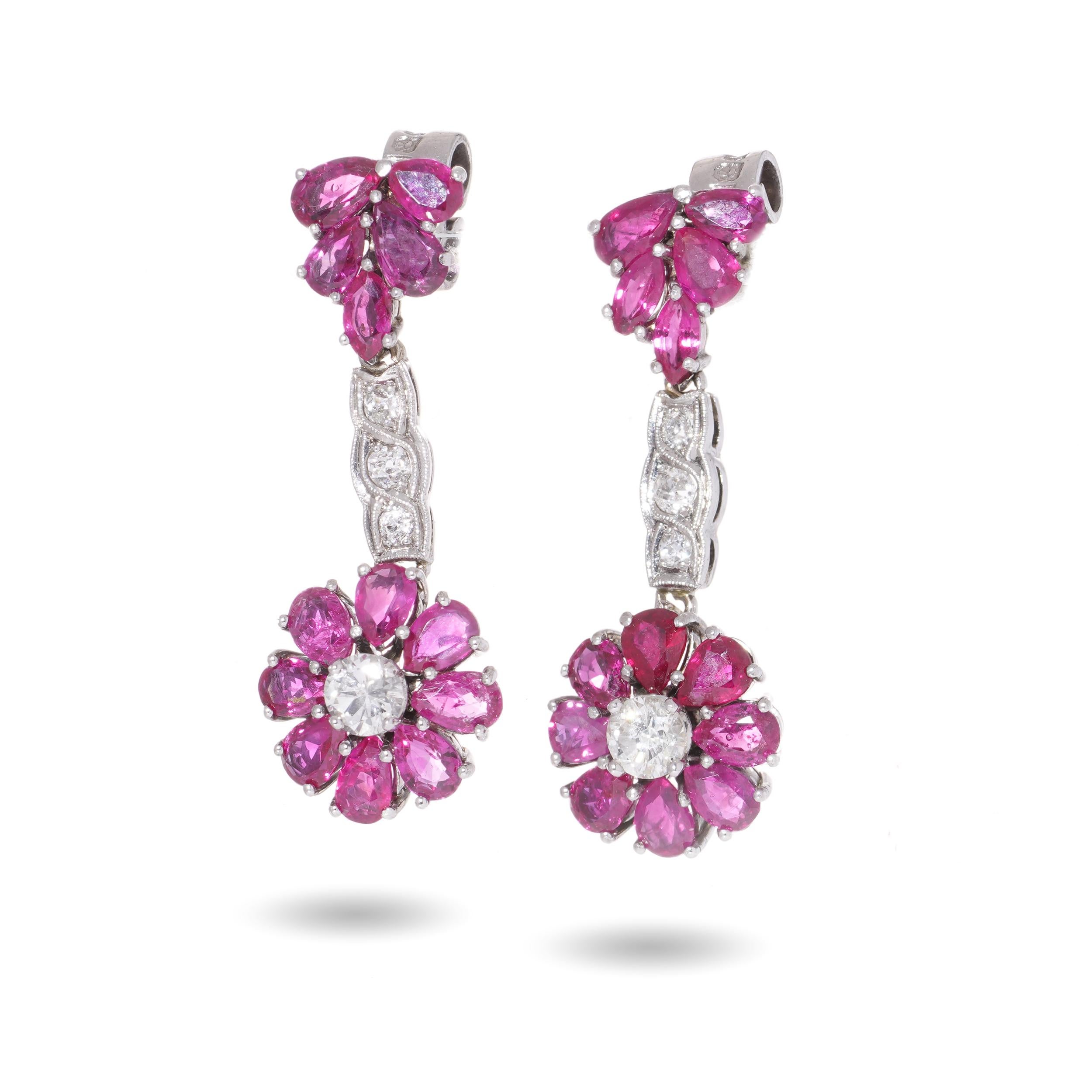 Women's 18kt. white gold pair of drop earrings with 2.60 cts of rubies and diamonds  For Sale