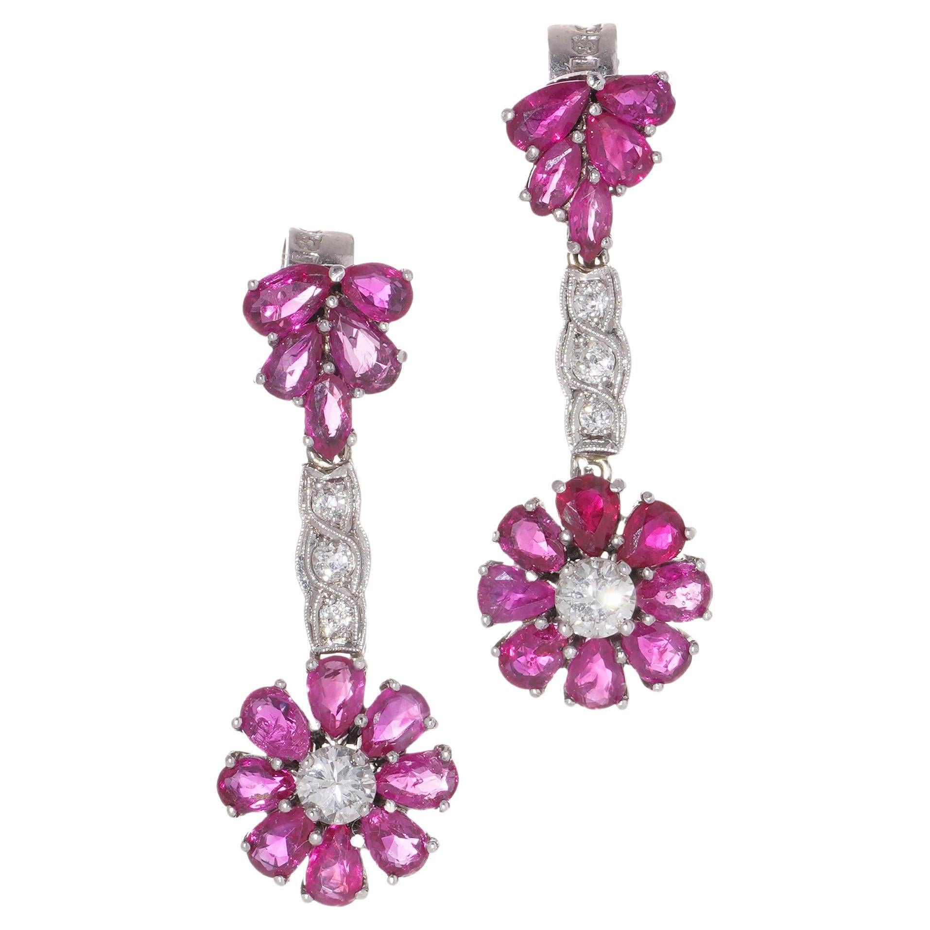 18kt. white gold pair of drop earrings with 2.60 cts of rubies and diamonds  For Sale