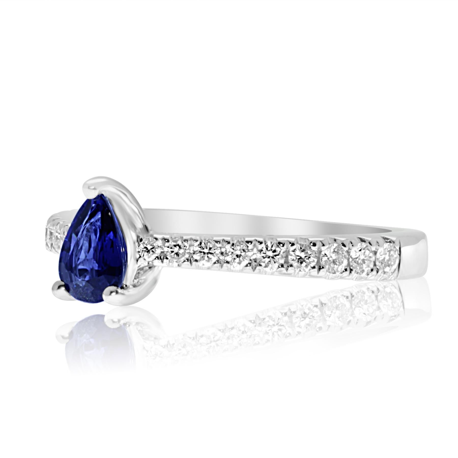 cute and elegant engagement ring, fine and discrete. 
a gorgeous way to tie the knot and stay in budget.
featuring a gorgeous pear shaped blue sapphire of 0.39ct.
sides are set with (18) brilliant cut diamonds weighing a total of 0.26ct.
ring size