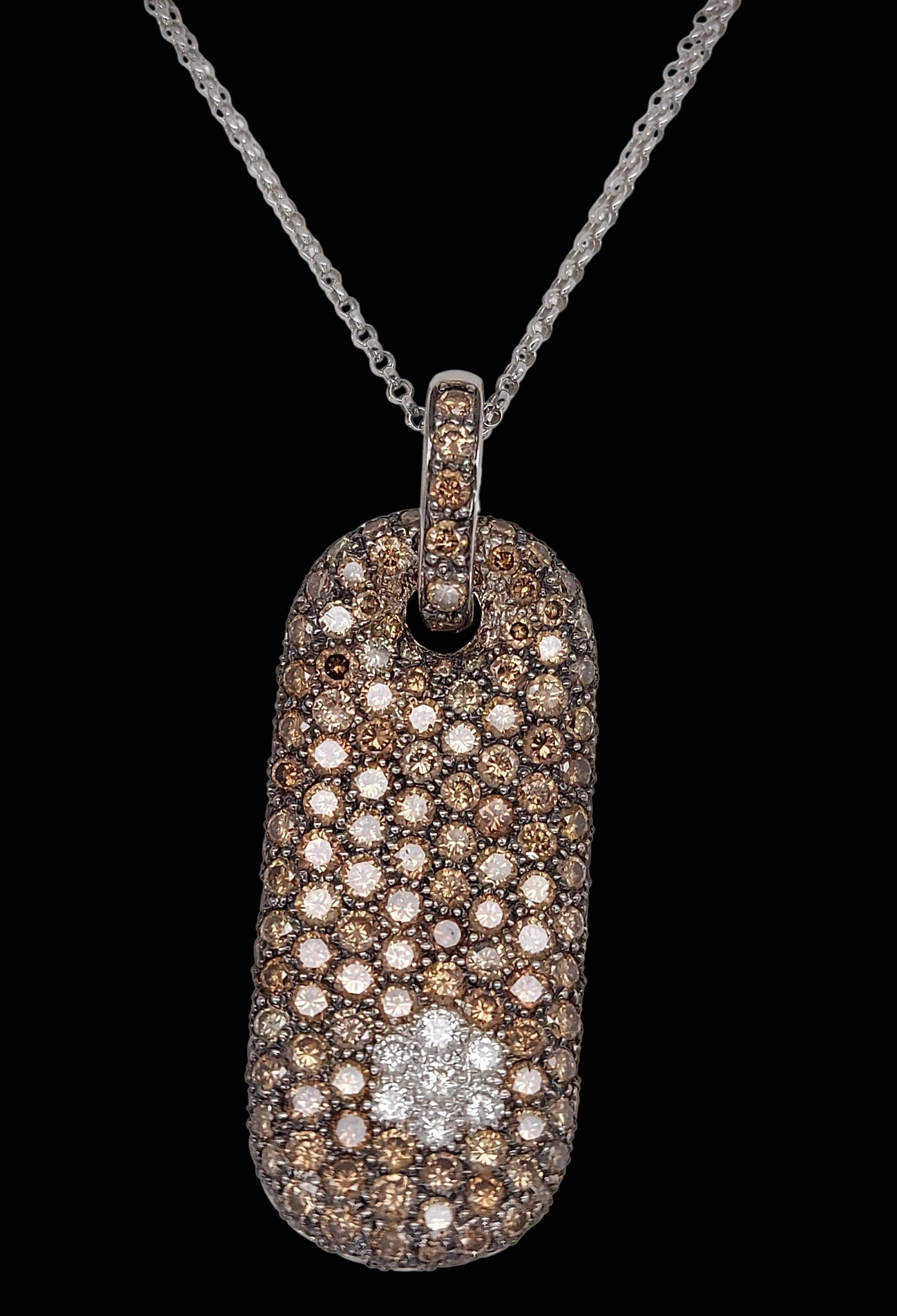 Very special 18Kt White Gold Pendant, Necklace With 0.28ct White & 6ct Brown Diamonds

Diamonds: Brilliant cut brown diamonds circa 6ct, brilliant cut  white diamonds 0.28ct.

Material: 18kt white gold

Total weight: 8.9 grams / 5.8 dwt / 0.315