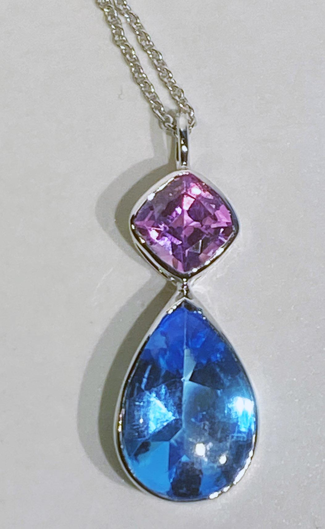 Modern 18kt White Gold Pendant Set with Blue Topaz & Pink Sapphire For Sale
