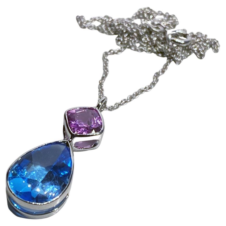18kt White Gold Pendant Set with Blue Topaz & Pink Sapphire For Sale