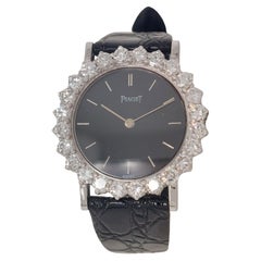 18kt White Gold Piaget Ladies Watch with Black Leather Strap and Diamonds