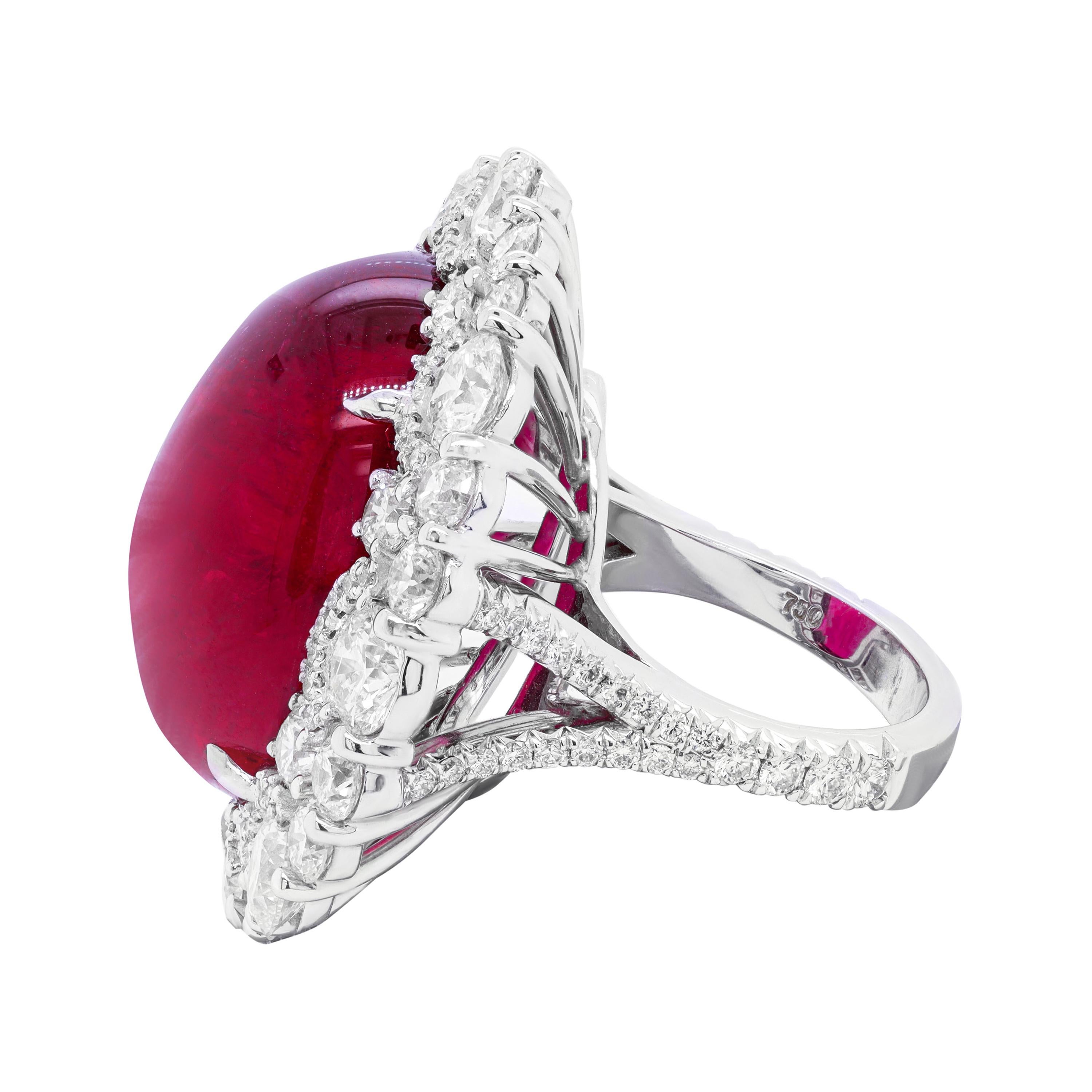 18kt white gold pink tourmaline cabochon diamond ring, features 32.84ct pink tourmaline and 10.00ct of round diamonds different size all  around.
