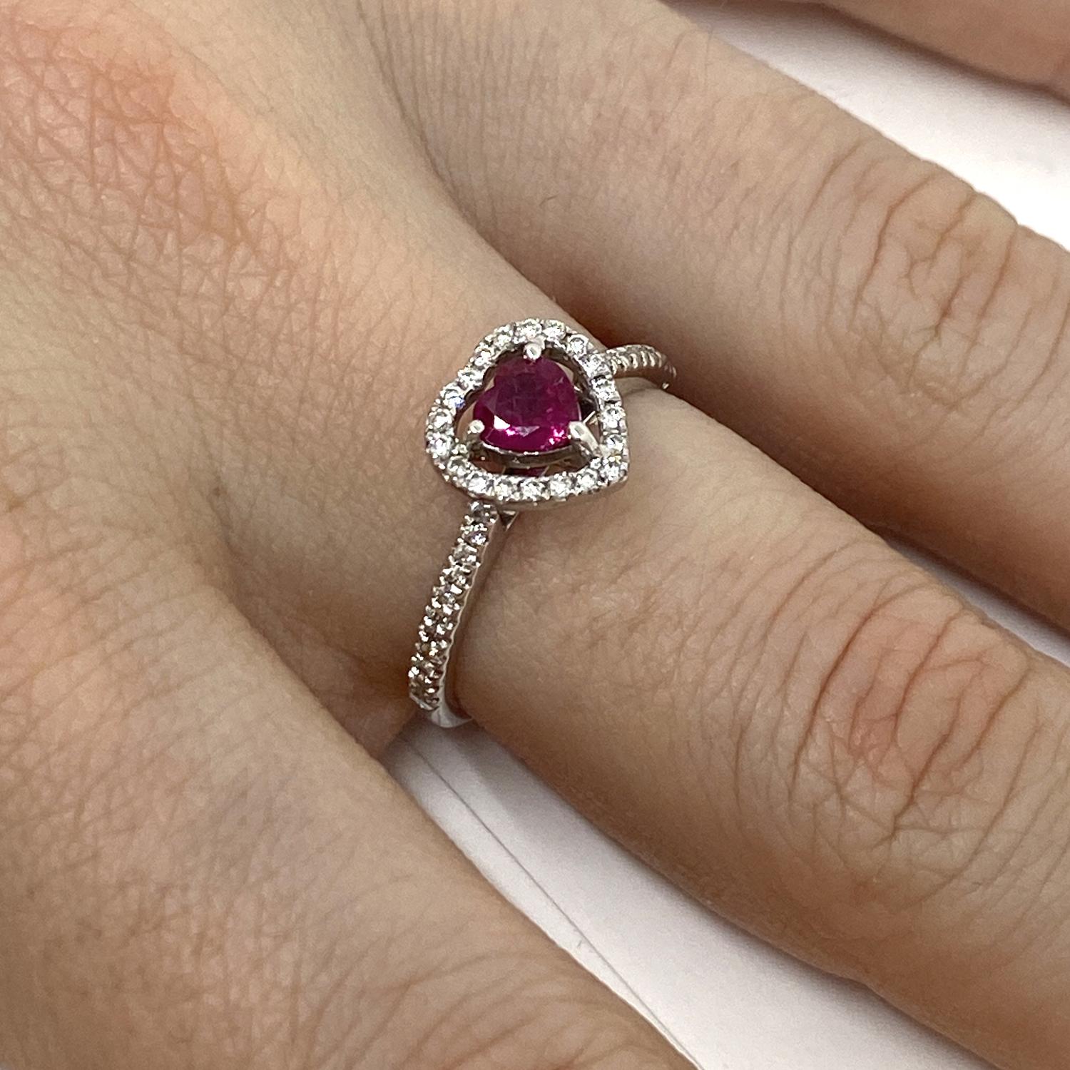 Ring made of 18kt white gold with natural heart-cut ruby for ct.0.52 and natural white brilliant-cut diamond surround for ct.0.24
-------------------------------------------------

Important Note : In order to speed up the publishing process of our