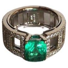 18kt White Gold Ring, 1.50ct Diamonds, 2.33ct Emeralds Cocktail Ring