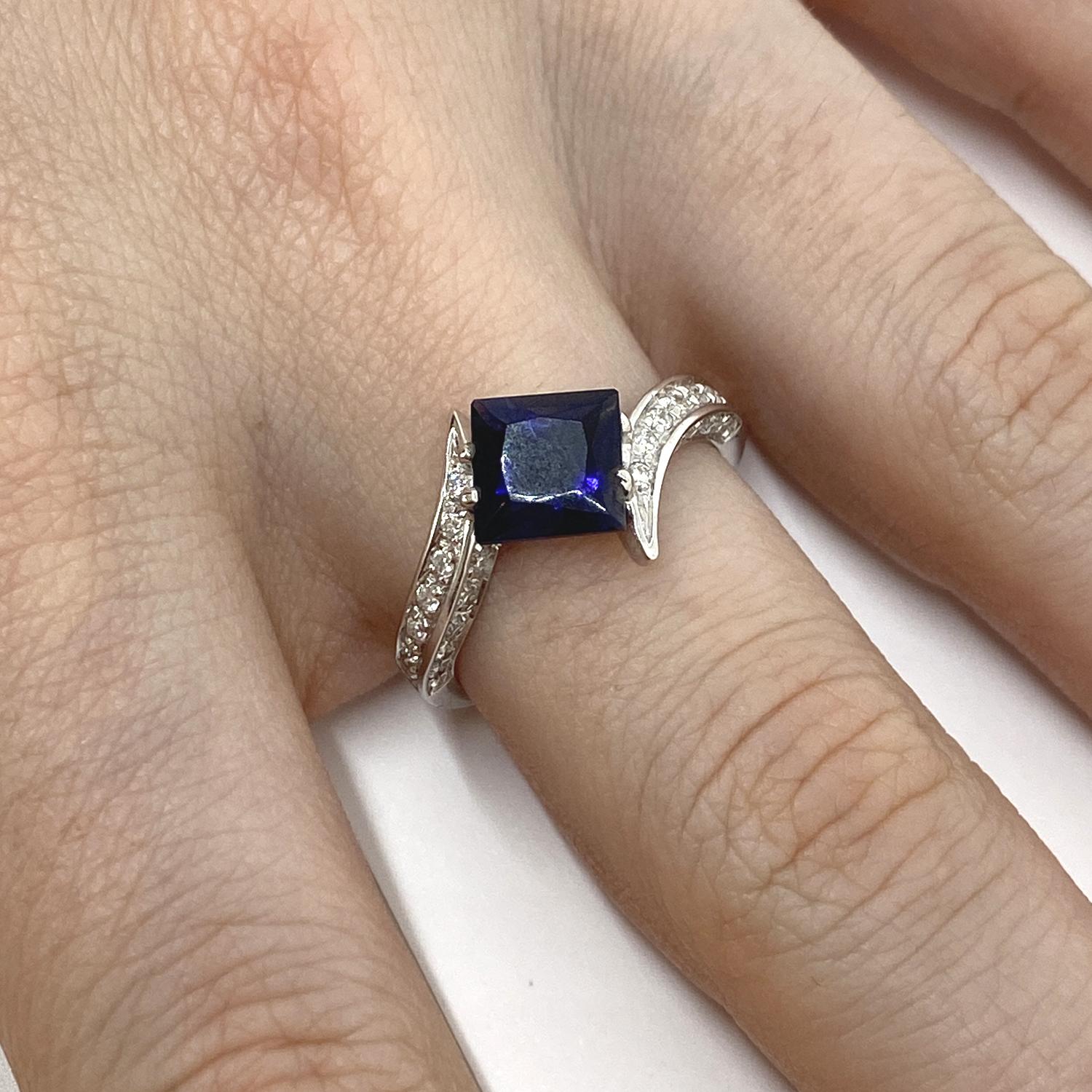 Ring made of 18kt white gold with natural Carré - cut iolite for ct . 1.80 and natural white brilliant-cut diamonds for ct.0.40
-------------------------------------------------

Important Note : In order to speed up the publishing process of our