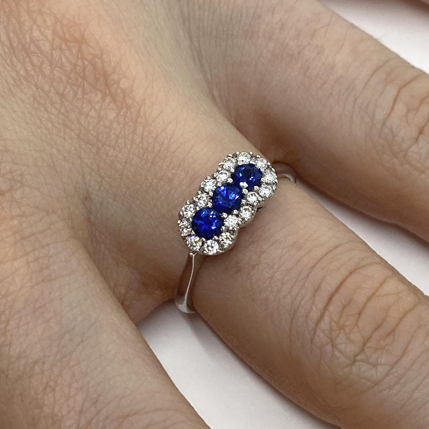 Ring made of 18kt white gold with three natural brilliant-cut blue sapphires for ct.0.45 and brilliant-cut white natural diamonds outline for ct.0.24

Welcome to our jewelry collection, where every piece tells a story of timeless elegance and