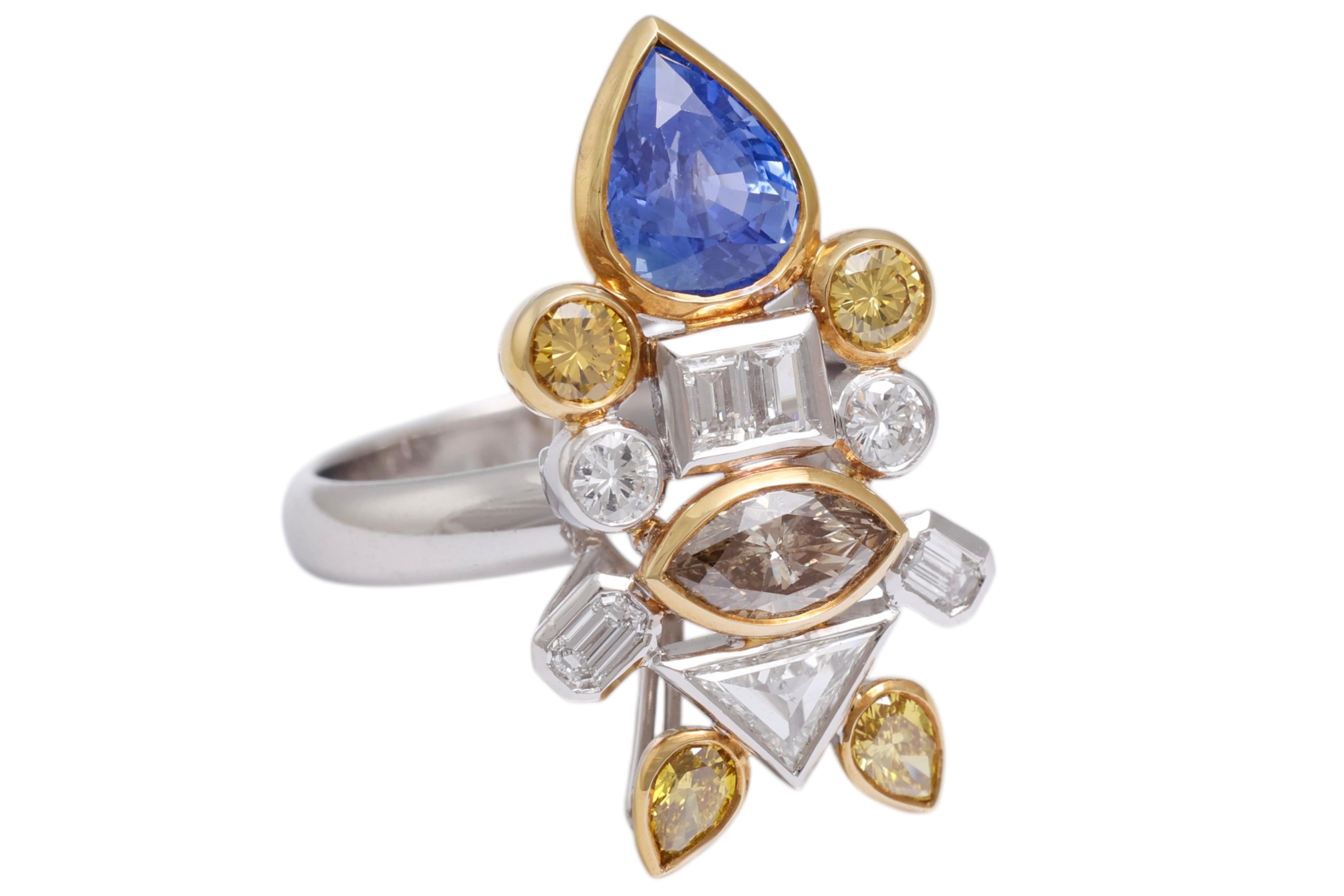 Women's or Men's 18kt white Gold Ring Depicting a Fish with 2.03ct Diamonds, 2.29ct Sapphires For Sale