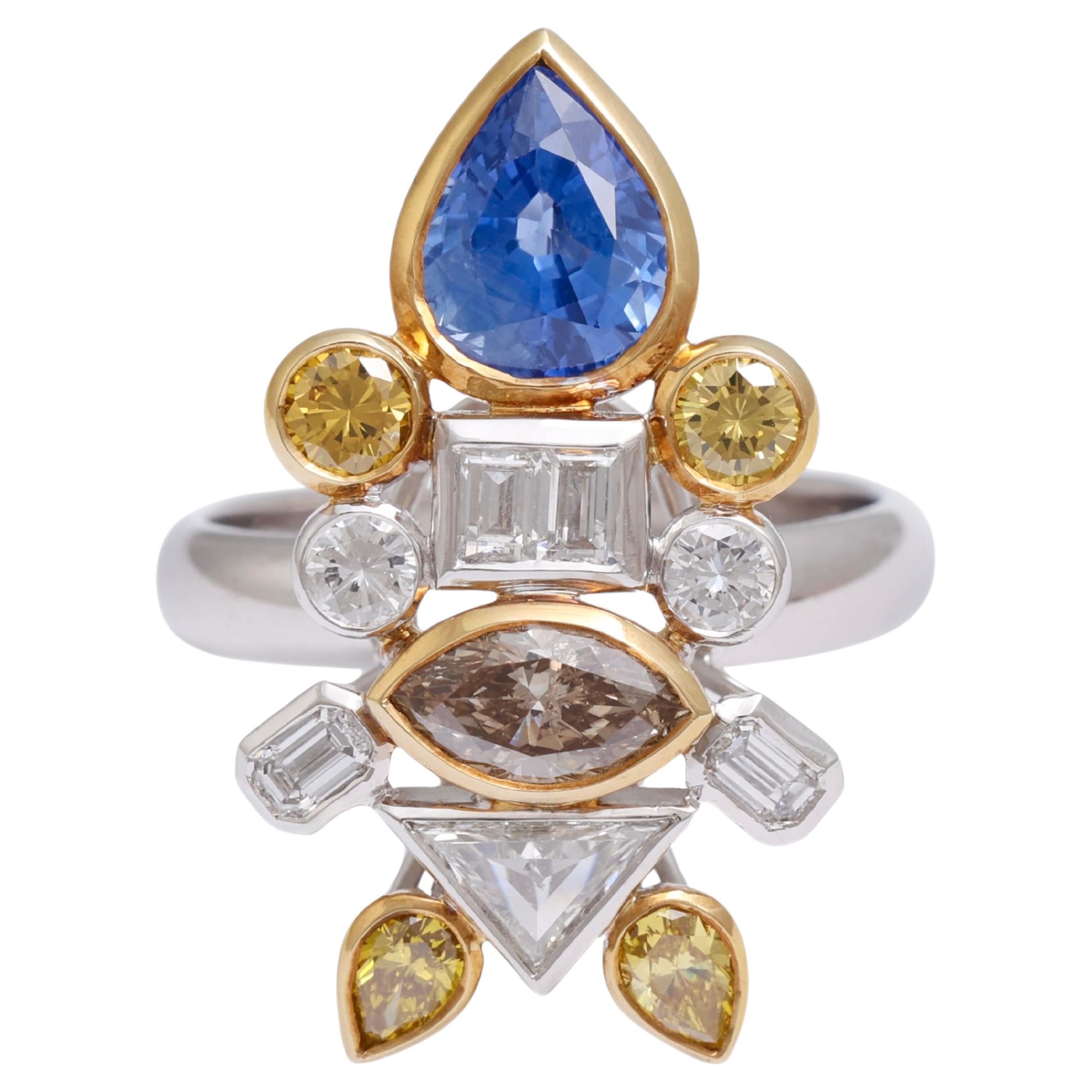 18kt white Gold Ring Depicting a Fish with 2.03ct Diamonds, 2.29ct Sapphires
