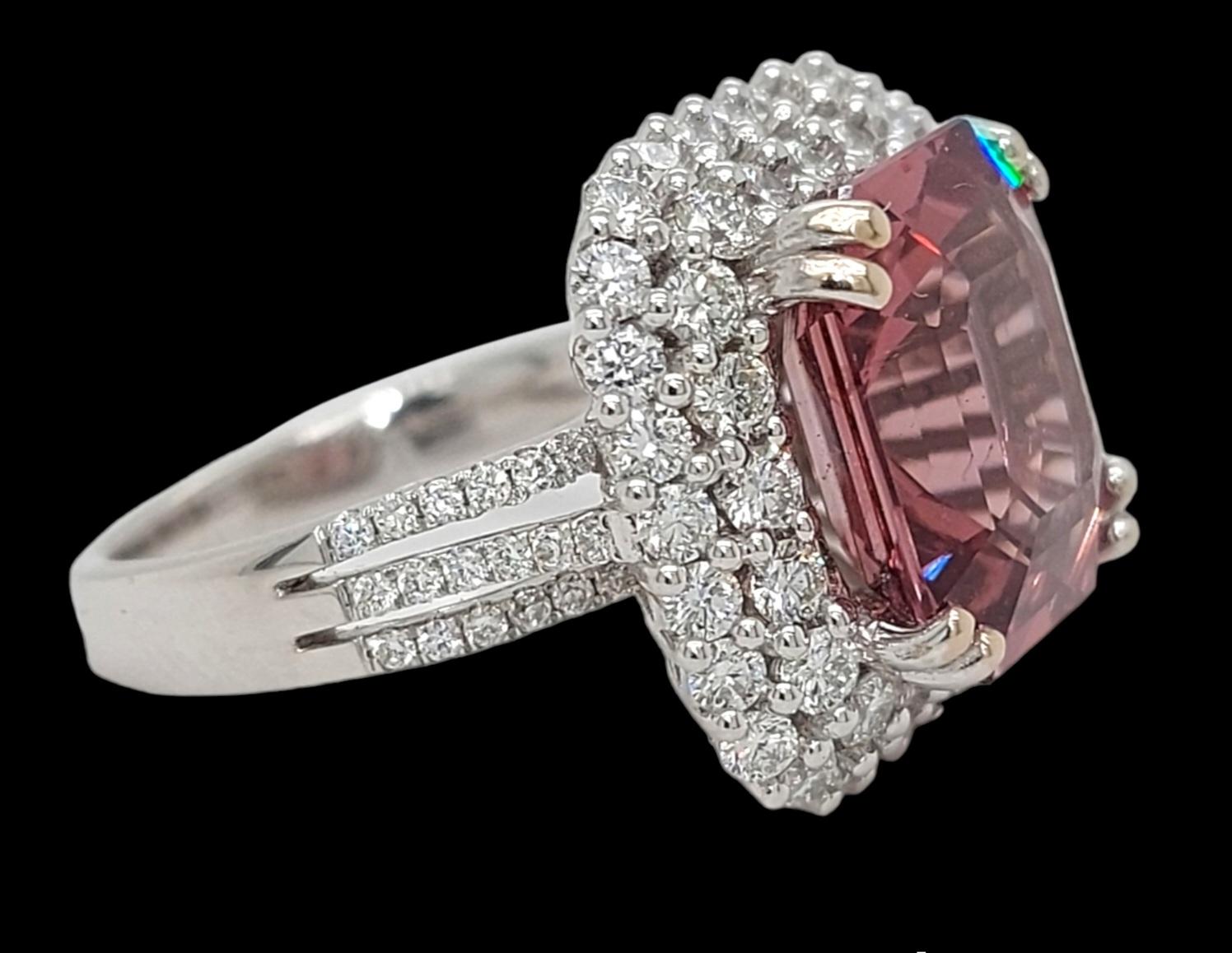 Magnificat 18kt White Gold Ring with Burmese No Heat 7.52ct Spinel and 2ct. Diamonds

Spinel: Natural Spinel Step cut, octagonal shape, orange pink colour, No indications of treatment, 7.52 ct. 
Comes with a GRS certificate GRS2022-067664

Diamonds: