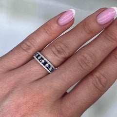18KT White Gold Ring with 0.54ct Diamonds & 0.75ct Baguette Sapphires