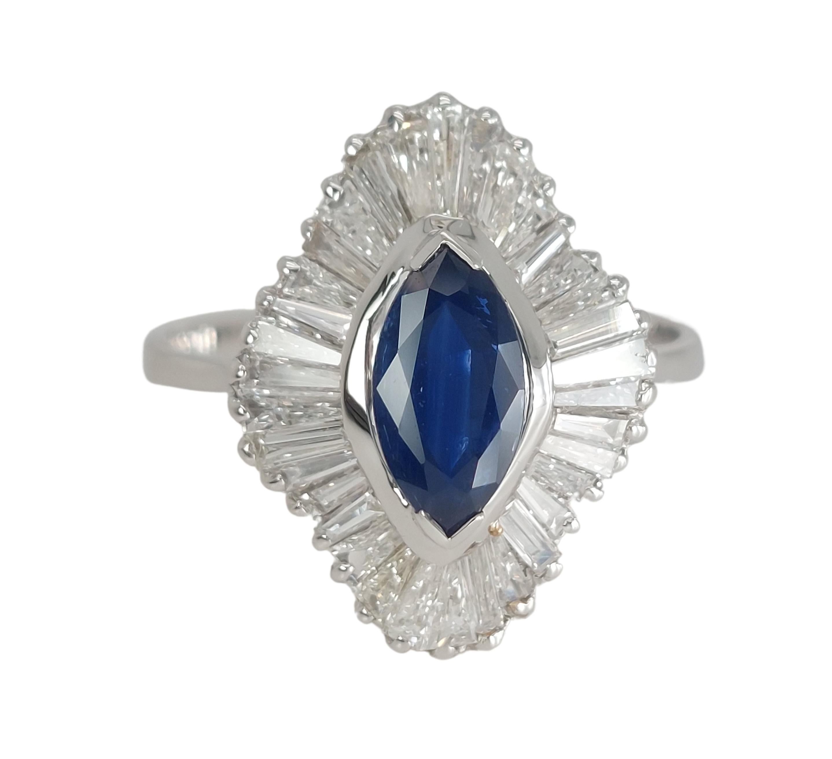 Beautiful 18kt White Gold Ring With 1.02ct Marquise Cut Sapphire and 2.4ct Diamonds 

Sapphire: Marquise cut sapphire, approx. 1.02ct

Diamonds: Baguette cut diamonds, together approx. 2.40ct

Material: 18kt white gold

Ring size: 56 EU / 7.75 US (