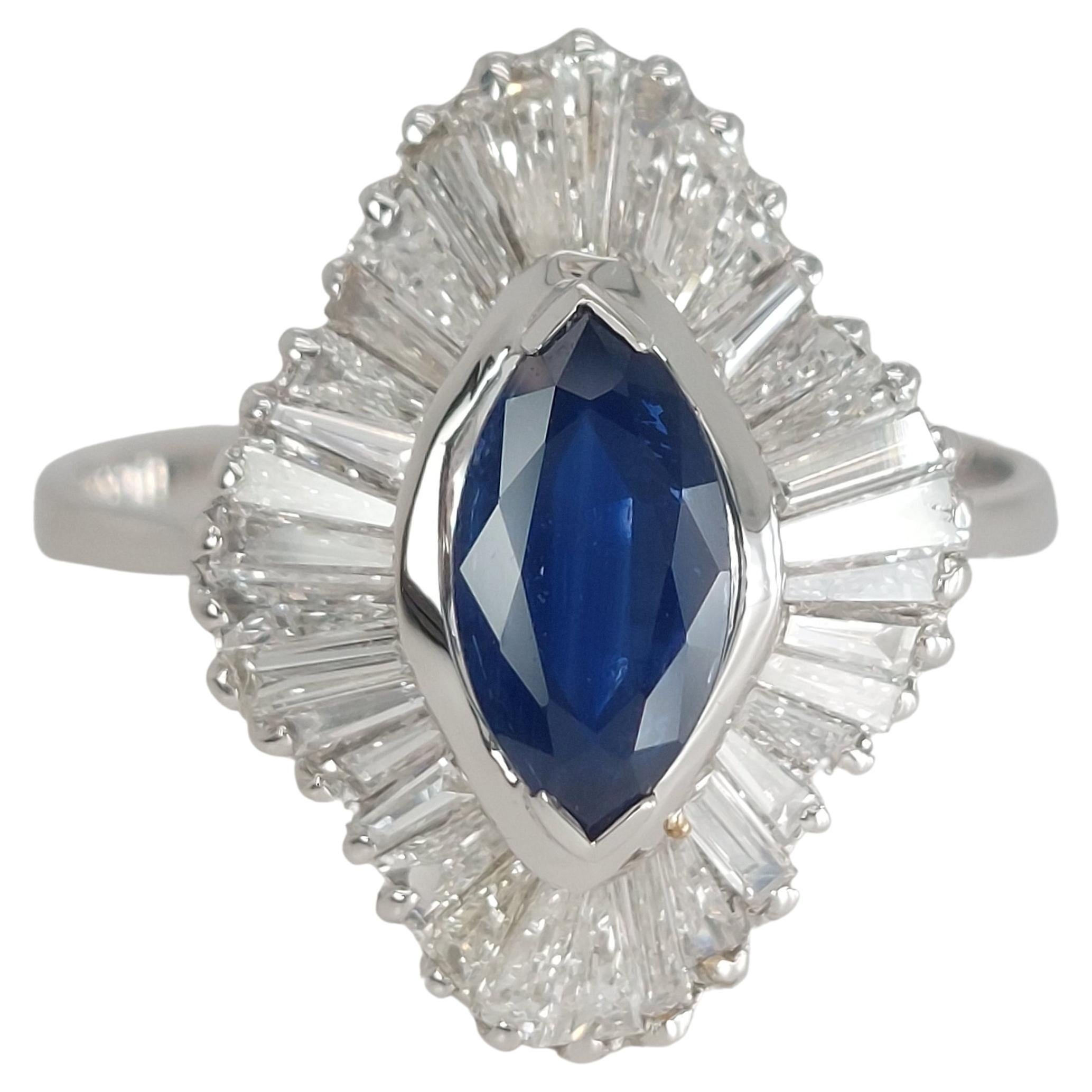 18kt White Gold Ring with 1.02ct Marquise Cut Sapphire and 2.4ct Diamonds For Sale