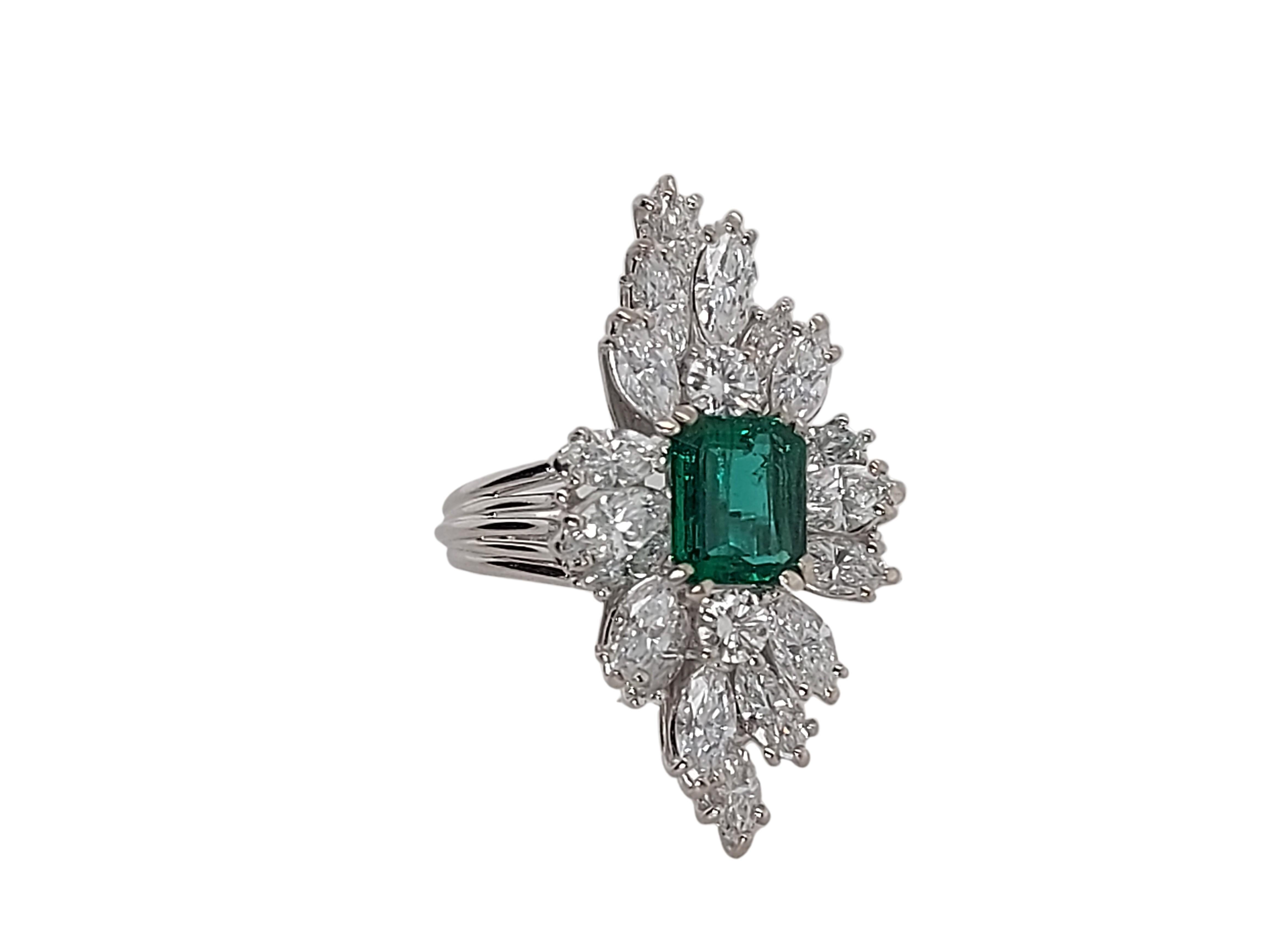 Octagon Cut 18kt White Gold Ring with 1.49 Ct Emerald Stone Surrounded by Diamonds For Sale