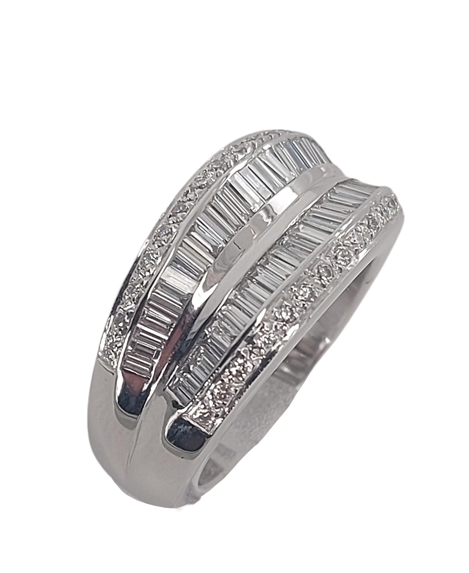 Gorgeous 18kt White Gold Ring With Baguette and Brilliant Cut Diamonds 

Diamonds: Brilliant cut diamonds, together approx. 0.30ct and baguette cut diamonds together approx. 1,7 ct

Material: 18 kt white gold

Ring size: 54.4 EU / 7 US ( can be