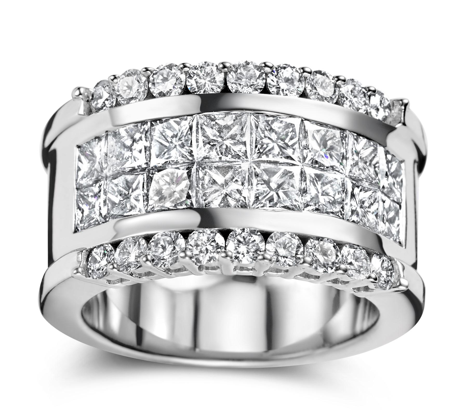 18kt White Gold Ring With 2.5 ct Princess cut & 1 ct Brilliant cut Diamonds

Diamonds: 16 Princess cut diamonds ( 2.5 Ct.) , 18 brilliant cut diamonds (1 Ct) Top Quality!
Colour: D/E . Clarity : Internally Flawless Flawless/VVS

One of  a kind solid