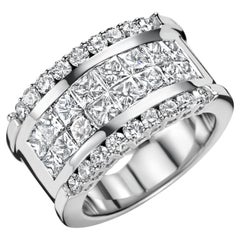 Bague en or blanc 18kt avec 2.5 ct Princesse et 1 ct Brilliante